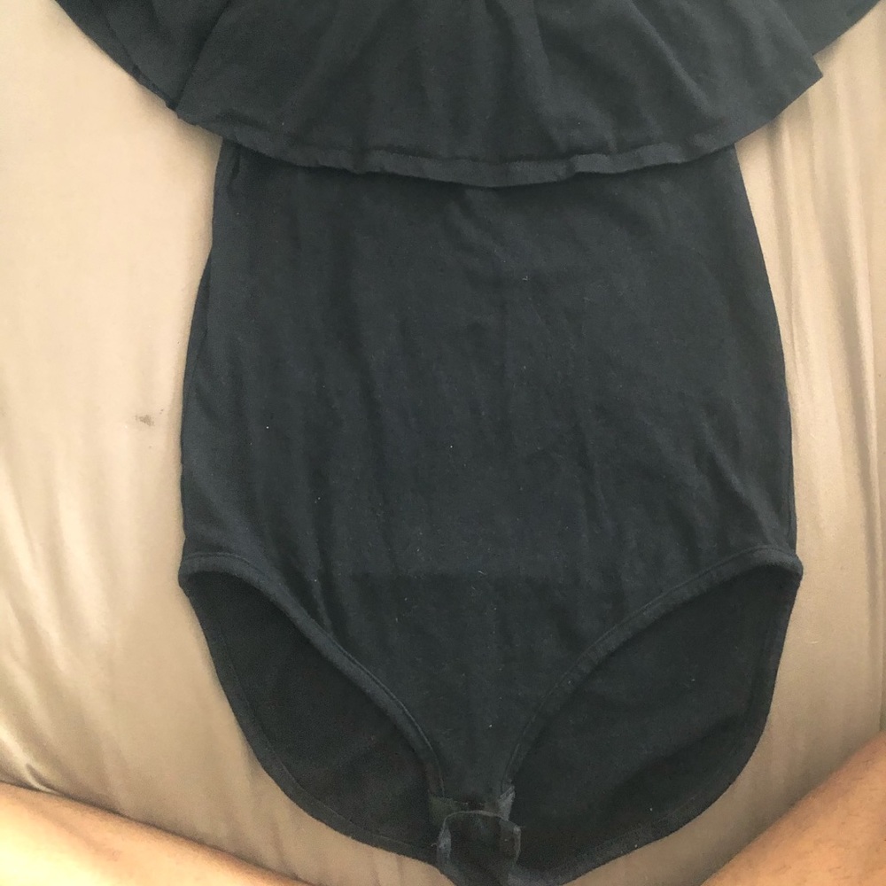 Black bodysuit with ruffle flounce